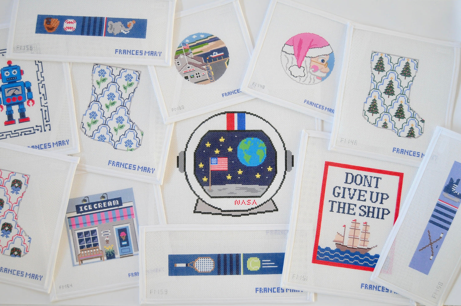 Hand painted needlepoint canvases by Frances Mary